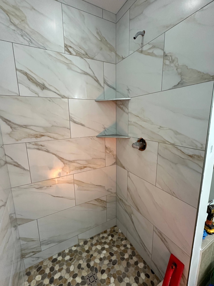 Finished bathroom - marble tile shower
